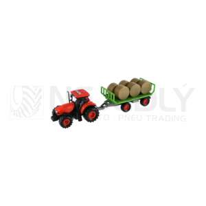 Traktor s vlekem a balíky